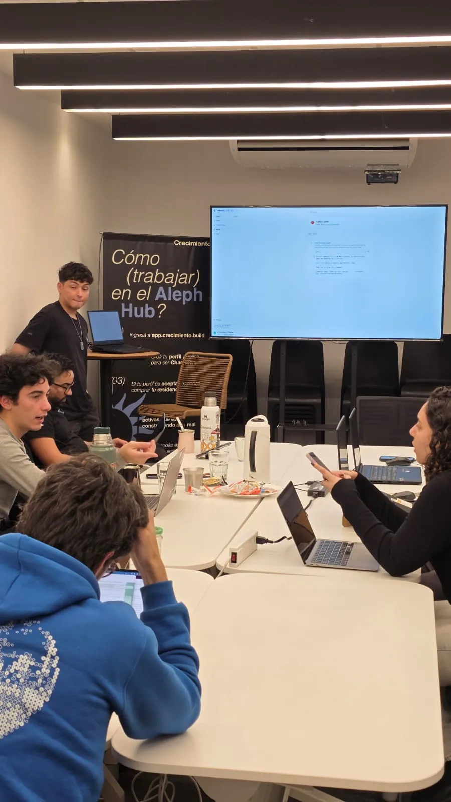 Builders around the table during the workshop